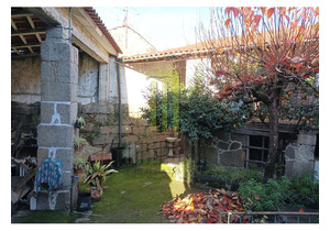 3 bedroom village house with a patio