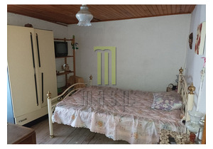 3 bedroom village house with a patio