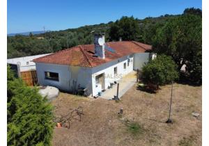 For sale: Large modern house with industrial barns, suitable for many activities.