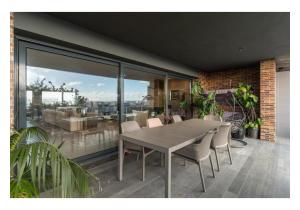 Stunning Lisbon Penthouse with Panoramic City and Tagus River Views for Sale